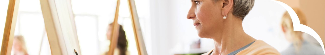 Woman sketching on canvas